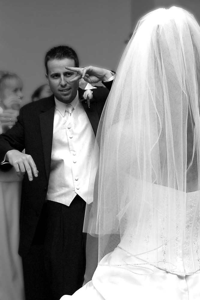A Happy Groom Voguing With His Lovely Bride